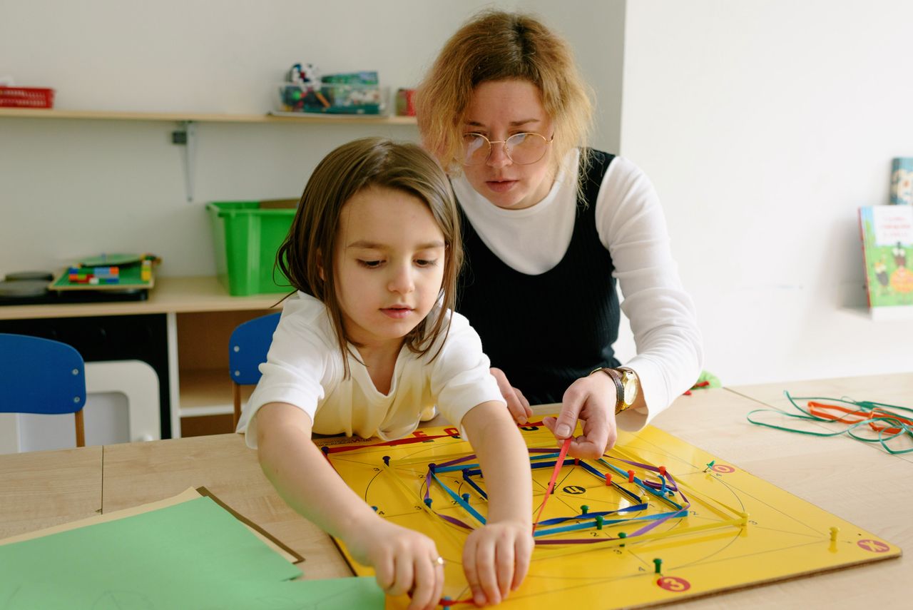 Children exploring engineering and problem solving through hands-on STEM activities