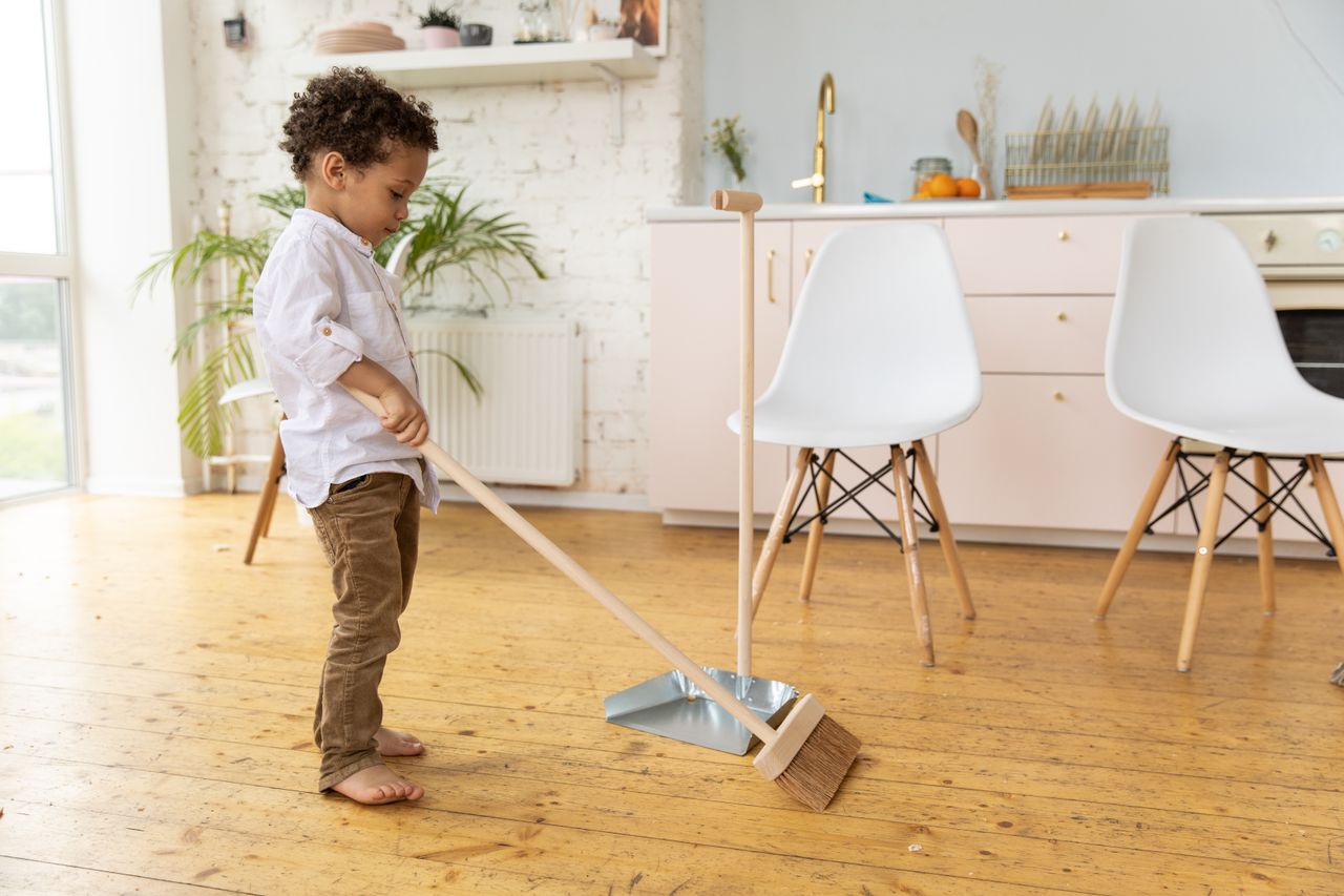 A younger Montessori child beginning to explore purposeful classroom work