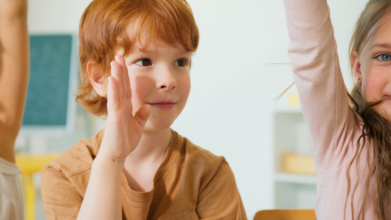 A Montessori child working independently with growing concentration and confidence