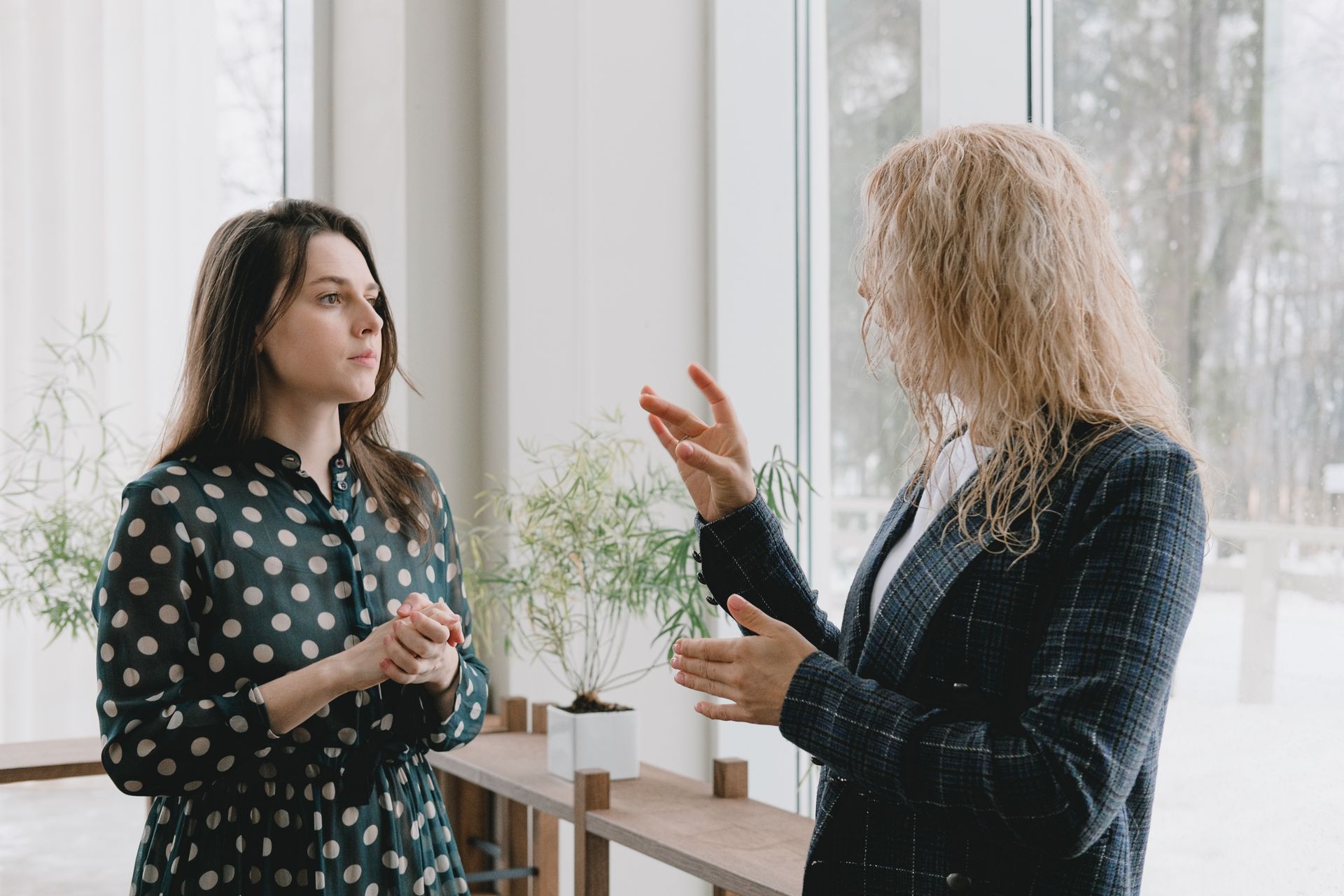 Parent and educator having a thoughtful conversation